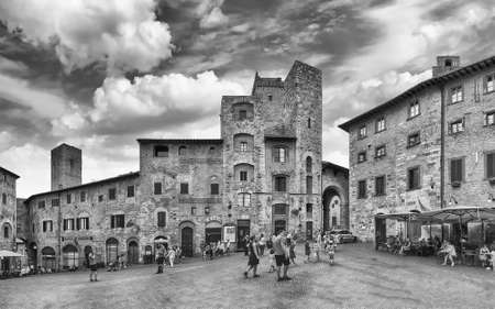 SAN GIMIGNANO, ITALY - JUNE 21: Panoramic view of Piazza della Cisterna square in the medieval town...