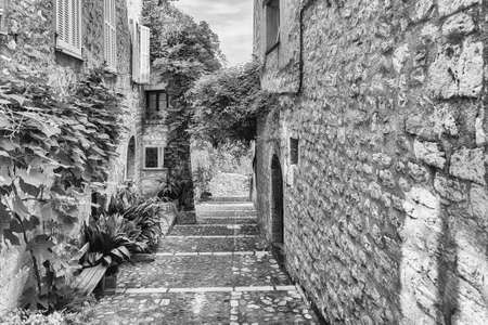 Walking in the picturesque streets of Saint-Paul-de-Vence, Cote d'Azur, France. It is one of the oldest medieval towns on the French Rivieraの写真素材