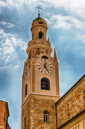 Bell tower of the Cathedral of San Siro in Sanremo, Italy. The church is the most ancient religious building and a major landmark of the cityの写真素材