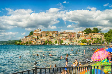 ANGUILLARA SABAZIA, ITALY - JULY 6: A sunny day on the Lake Bracciano from the town of Anguillara near Rome, Italy, on July 6, 2014のeditorial素材