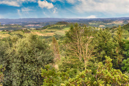 Beautiful landscape view from the town of San Gimignano, iconic town in the province of Siena, and...