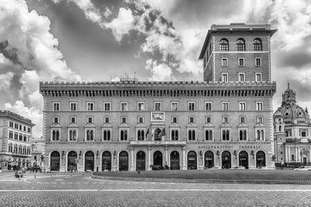 ROME - APRIL 14, 2021: Facade of the iconic building of Assicurazioni Generali, the largest Italian insurance company, located in Piazza Venezia, Rome, Italyのeditorial素材