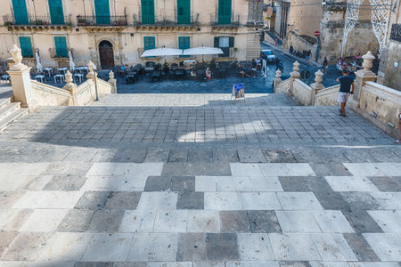 NOTO, ITALY - AUGUST 12, 2021: Steps of the Church of Saint Francis of Assisi, iconic building in Noto, picturesque town in Sicily, Italyのeditorial素材