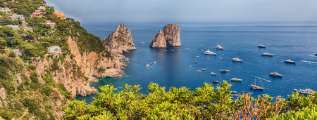 Panoramic view over Marina Piccola and Faraglioni: coastal wonders in Mediterranean splendor of the island of Capri, Italyの写真素材