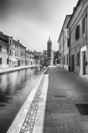 Walking in the center of Comacchio, picturesque town with canals and bridges in the province of Ferrara, Italyの写真素材