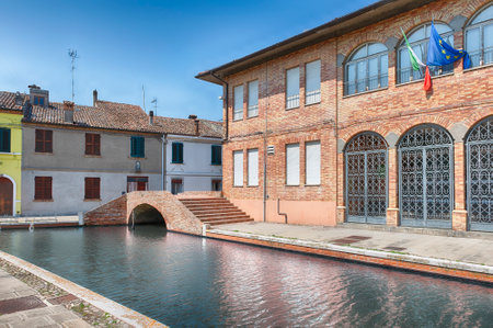 Walking in the center of Comacchio, picturesque town with canals and bridges in the province of Ferrara, Italyの写真素材