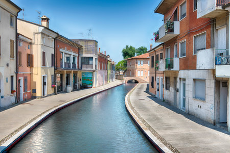 Walking in the center of Comacchio, picturesque town with canals and bridges in the province of Ferrara, Italyの写真素材