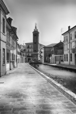 Walking in the center of Comacchio, picturesque town with canals and bridges in the province of Ferrara, Italyの写真素材