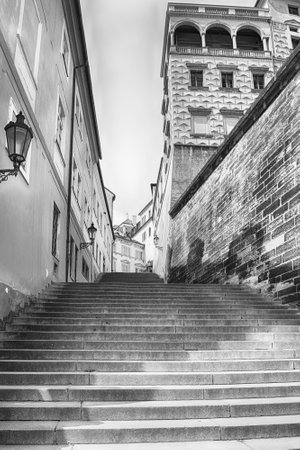 Upward view of a stairway leading up to the old town in Prague, Czech Republicの写真素材