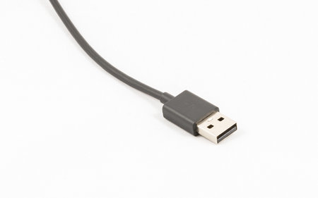 Black USB cable isolated on white backgroundの写真素材