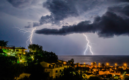 Lightning over the sea, night sceneの写真素材