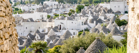 Scenic panoramic view of Alberobello town and its typical trulli buildings, Apulia, Italyの写真素材