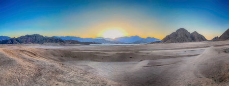 The scenic sunset in the desert landscape near Sharm el Sheikh, South Sinai, Egyptの写真素材