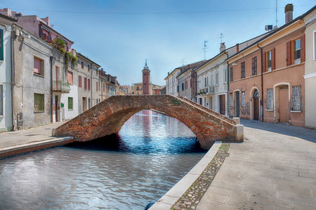 Walking in the center of Comacchio, picturesque town with canals and bridges in the province of Ferrara, Italyの写真素材