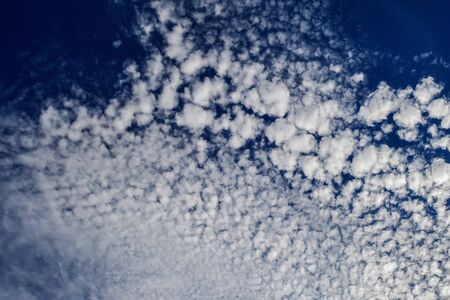 Beautiful blue and white cloudy sky backgroundの写真素材