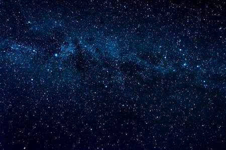 Clear night sky with milky way and huge amount of stars.の写真素材