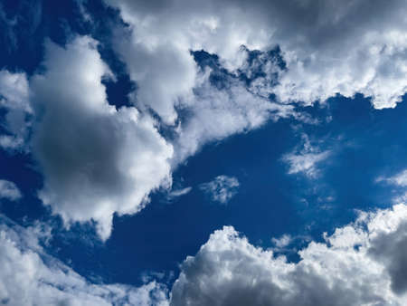 View on deep blue sky. Cloudscape photography on a daytime.