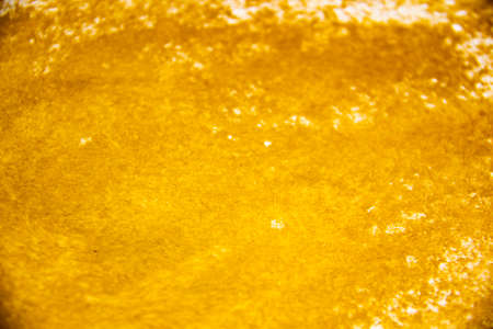 Gold background with scuffs. Golden Background and texture. Shiny gold and yellow background,の写真素材