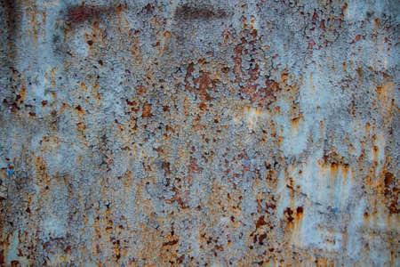 Rusty background. Shabby. Blue background. Rust. Vintage. Interesting texture.