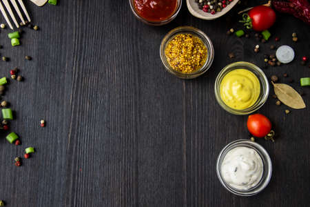 Cooking food background with free space for text. Composition with ingredients over the wood background. Ingredients for cooking with copy space. Top view with copy spaceの写真素材