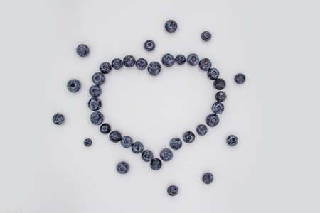 A Blueberry Heart. The heart's frame from the berries. Beautiful blueberries making a heart frame.の写真素材