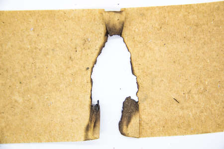 Burnt Pieces of Vintage Paper can be used in design. Old paper with burnt edges on white background.の写真素材