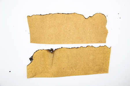 Burnt Pieces of Vintage Paper can be used in design. Old paper with burnt edges on white background.の写真素材