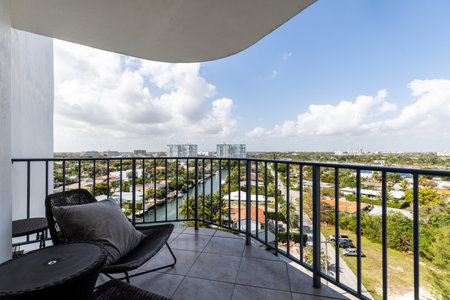Beautiful view from the balcony towards the bay of Miami, bridge with trees, horizon, blue sky, tropical vegetationの写真素材