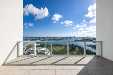 Balcony shot of the commercial area in downtown Miami, parks, bridges, cars, modern buildings, museums, towers, piers, bridges and blue skyの写真素材