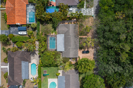 Aerial drone Shots in Miami, USA, commercial area, luxury houses, buildings and mansions, abundant tropical vegetation around and blue sky.の写真素材