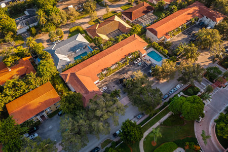 Aerial drone Shoot in USA, commercial area, luxury houses, buildings and mansions, abundant tropical vegetation around, blue sky and Ocean.の写真素材