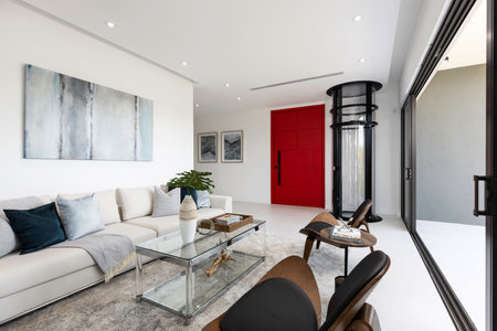 Beautiful photos of the interior of a Apartment. Luxurious, modern living room with cozy furniture and elegant architecture.の写真素材