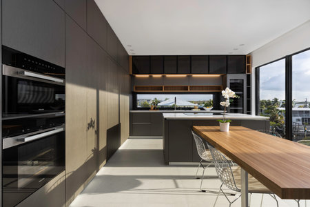 Beautiful photos in the interior of a Apartment. Luxurious, modern Dining room with cozy furniture and elegant architecture.の写真素材