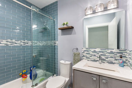 Photoshoot Footage located in Florida, USA. Clean, modern bathroom with refreshing shower, reflecting mirror, Bathtub and sleek tiles.の写真素材