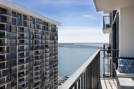View from the balcony of a modern apartment building with a sea viewの写真素材