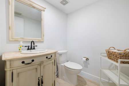 Interior of a bathroom with white walls and white floor. Northwest, USAの写真素材