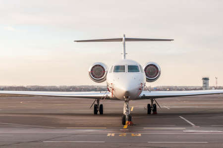 Luxury business jet stands at the airport and ready for boarding. Private aircraft front viewの写真素材