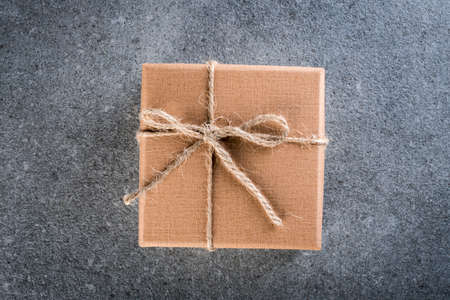 Brown gift box on dark backgroundの写真素材