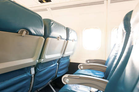 Empty aircraft seats and windows. Travel backgroundの写真素材
