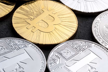 Financial growth concept with golden Bitcoins and Litecoin. Cryptocurrency, Virtual money and payment system conceptの写真素材