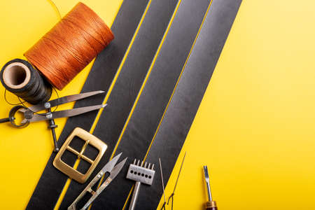 Leather crafting tools still life. Handmade accessories