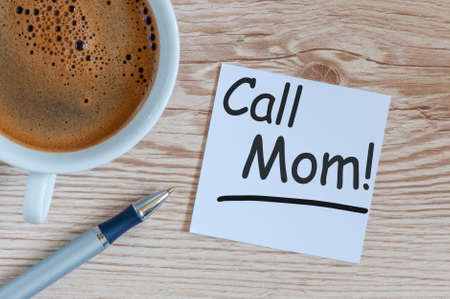 Call Mom - A message asking or reminding you to call your mom. Parenting Conceptの写真素材