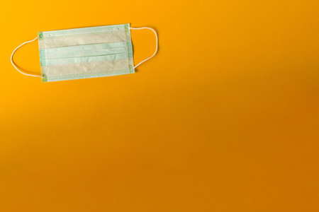 Medical face mask - protection against diseases and virus. Covid-19 - Coronavirus pneumonia. Empty copy space, templateの写真素材