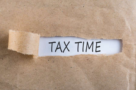 Tax time - Notification of the need to file tax returns, message for accountant - fill in tax formの写真素材
