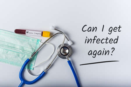 Can I get reinfected or infected again - question at white background with doctor outfit. Covid-19 Coronavirus conceptの写真素材