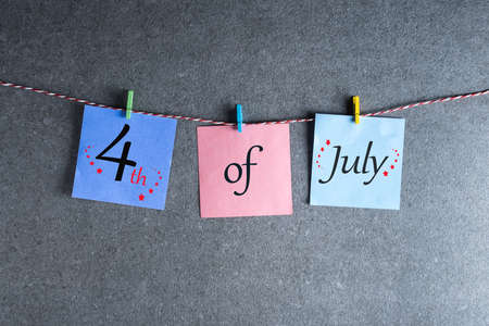 Independence Day Celebration. July 4th. Image of july 4 calendar at grey background. Summer dayの写真素材