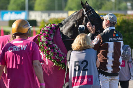210530 Solvalla - The winner horse of Elitloppet Propulsionand the driver Orjan Kihlstrom win the final of the Elitloppet trotting event at Solvalla track in Stockholm Sweden. High quality photoのeditorial素材