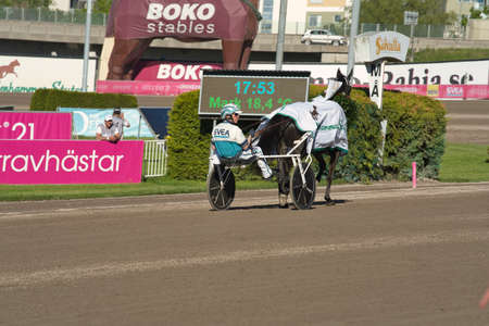210530 Solvalla - The winner horse of Elitloppet Propulsionand the driver Orjan Kihlstrom win the final of the Elitloppet trotting event at Solvalla track in Stockholm Sweden. High quality photoのeditorial素材
