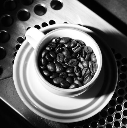 A cup of coffee beans, monotone colorの写真素材