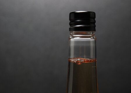 Different liquid level in bottleの写真素材